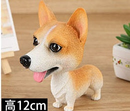 Figurines de chiot secouant la tête