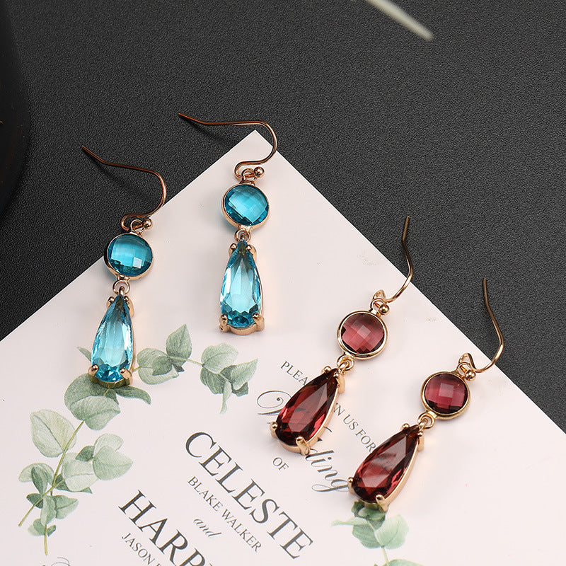 Boucles d'oreilles pendantes en cristal de verre K9 multicolore géométrique à bordure en cuivre