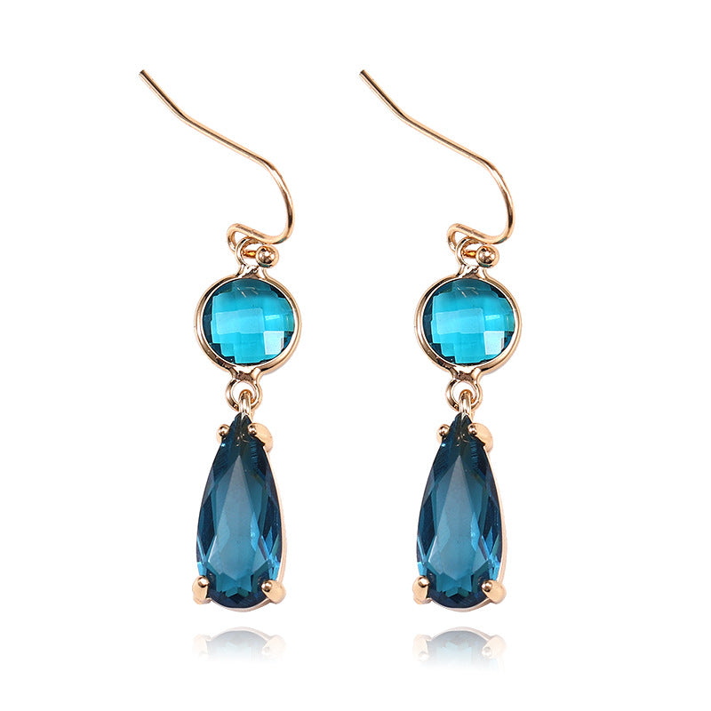 Boucles d'oreilles pendantes en cristal de verre K9 multicolore géométrique à bordure en cuivre
