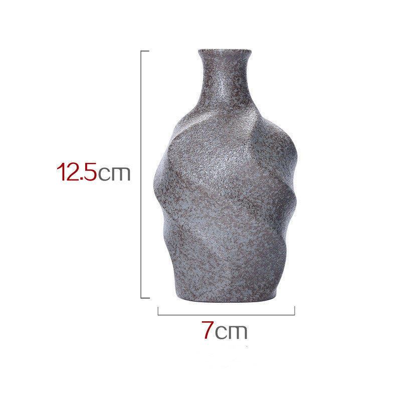 Vase en céramique simulant un vase à fleurs sèches