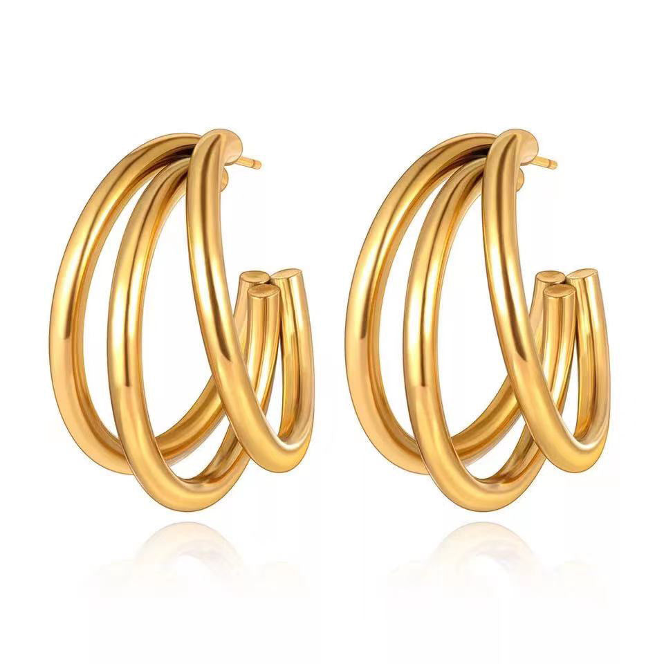 Boucles d'oreilles N multicouches en acier titane