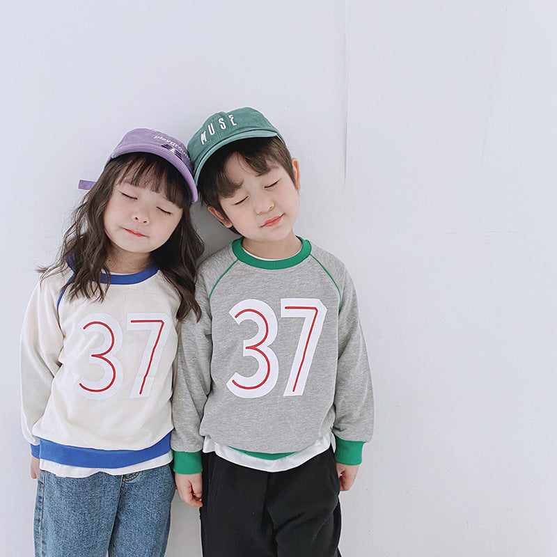 Ropa para niños al por mayor otoño nuevos niños suéter de cuello redondo niña bebé 37 letras color a juego suéter de niños coreanos