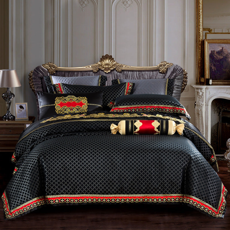 Sábana de cuatro piezas en jacquard bordado