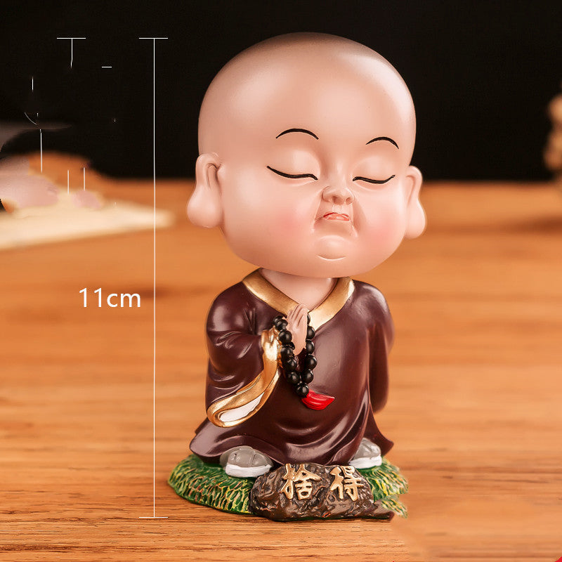 Car car decoration Zen Miao shook her head