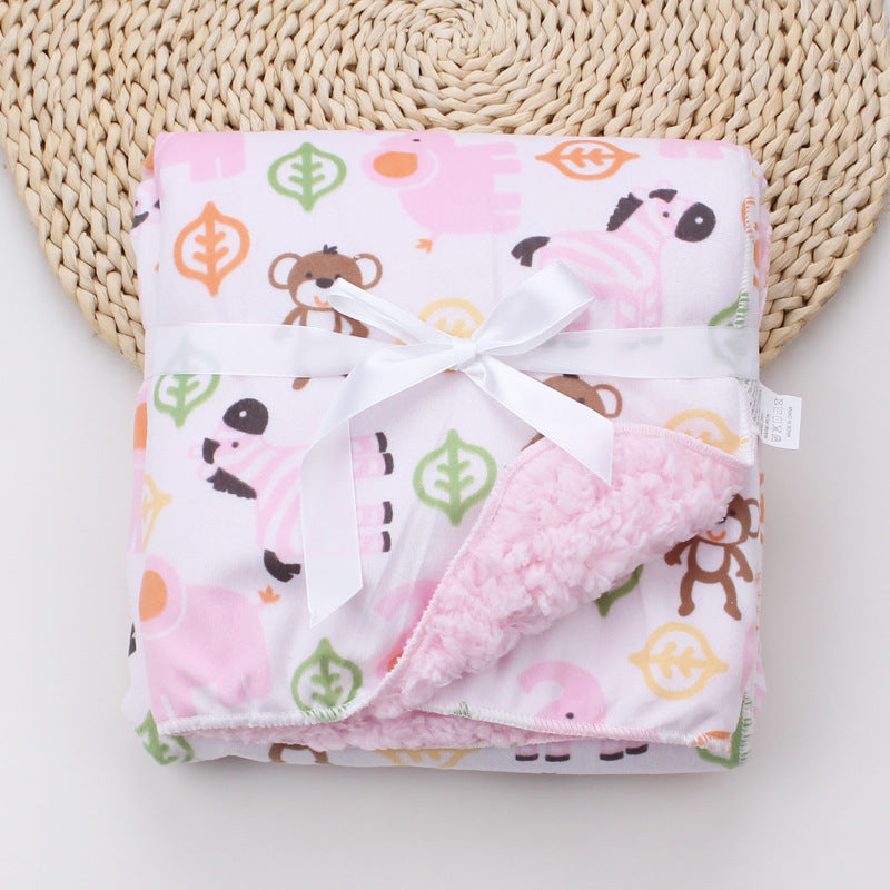 Manta de bebé con estampado de dibujos animados.
