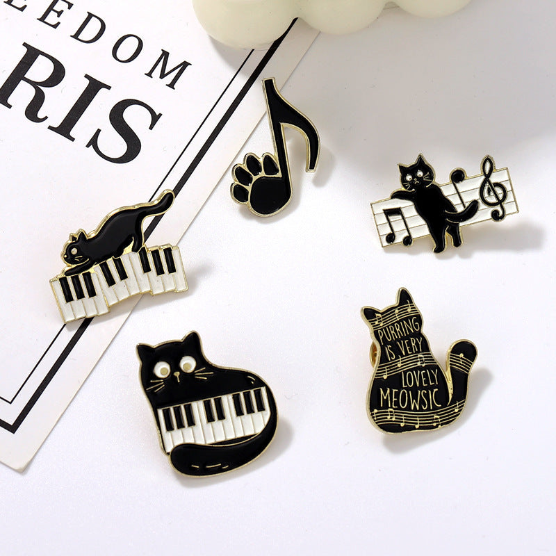 Broche en alliage de notes de piano de chat noir mignon