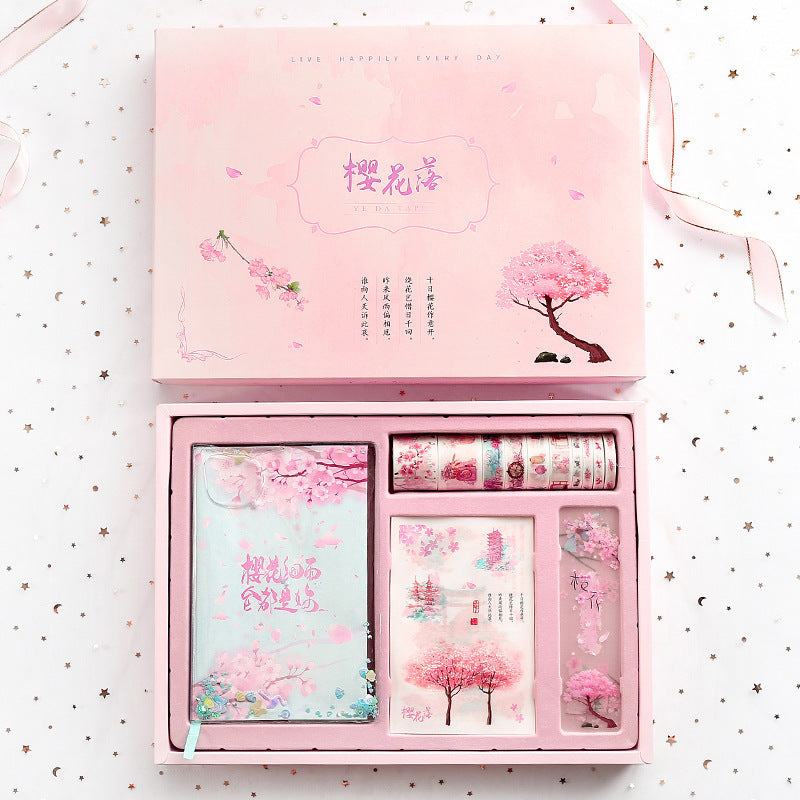 Lindo y creativo juego de caja de regalo con libro mayor de mano en flor de cerezo