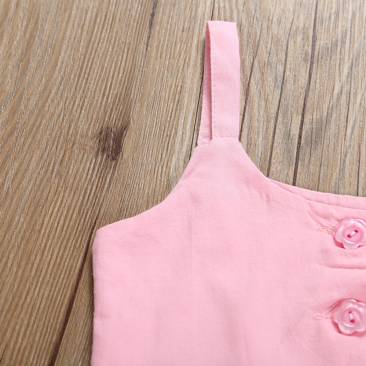 Ropa infantil con volantes y estampado de flamencos de arce.