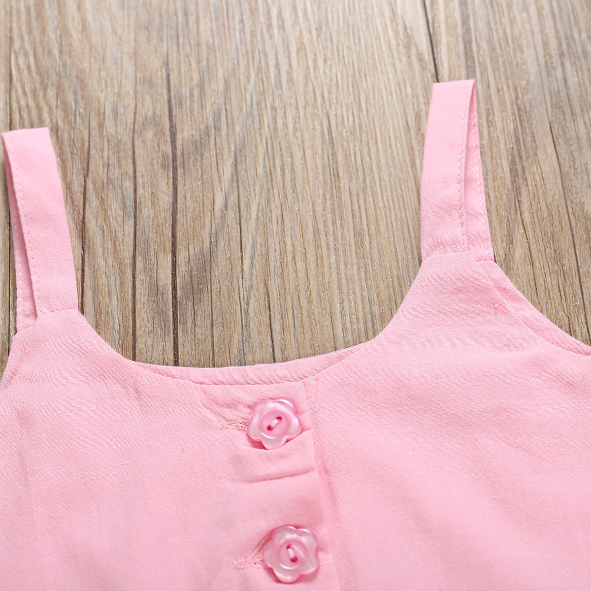 Ropa infantil con volantes y estampado de flamencos de arce.