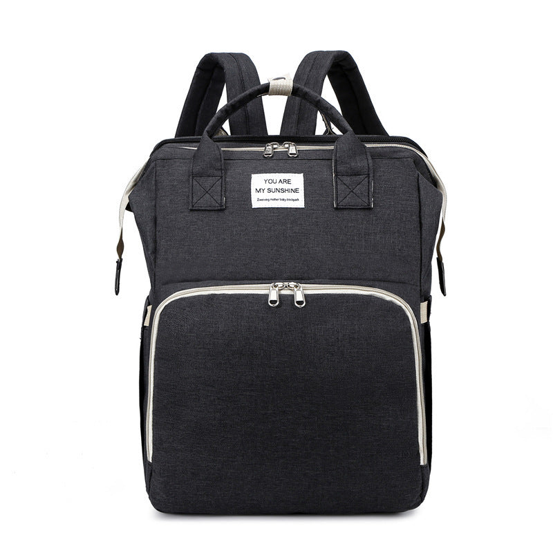 Bolsa de mamá cama de bebé plegable Boomerang bolsa portátil para madre y bebé