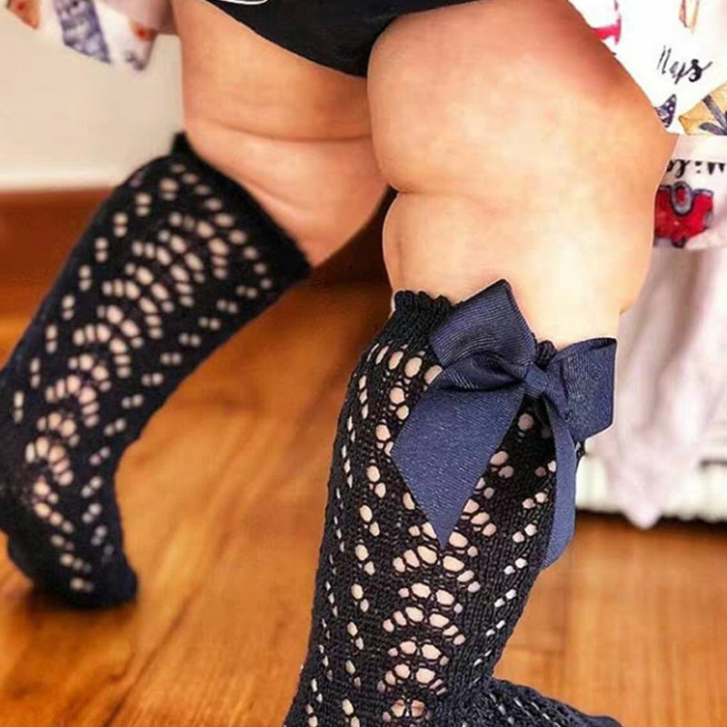 Calcetines bonitos hasta la rodilla para niñas, calcetines suaves transpirables de algodón con lazos para niños, calcetines largos antideslizantes con agujeros para recién nacidos