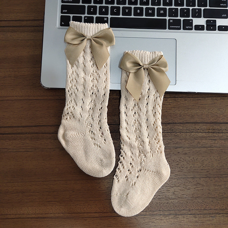 Calcetines bonitos hasta la rodilla para niñas, calcetines suaves transpirables de algodón con lazos para niños, calcetines largos antideslizantes con agujeros para recién nacidos