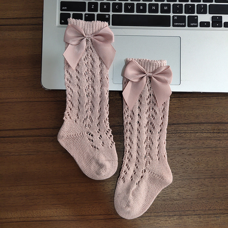 Calcetines bonitos hasta la rodilla para niñas, calcetines suaves transpirables de algodón con lazos para niños, calcetines largos antideslizantes con agujeros para recién nacidos