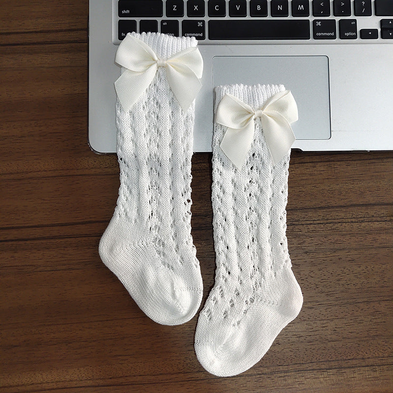 Calcetines bonitos hasta la rodilla para niñas, calcetines suaves transpirables de algodón con lazos para niños, calcetines largos antideslizantes con agujeros para recién nacidos