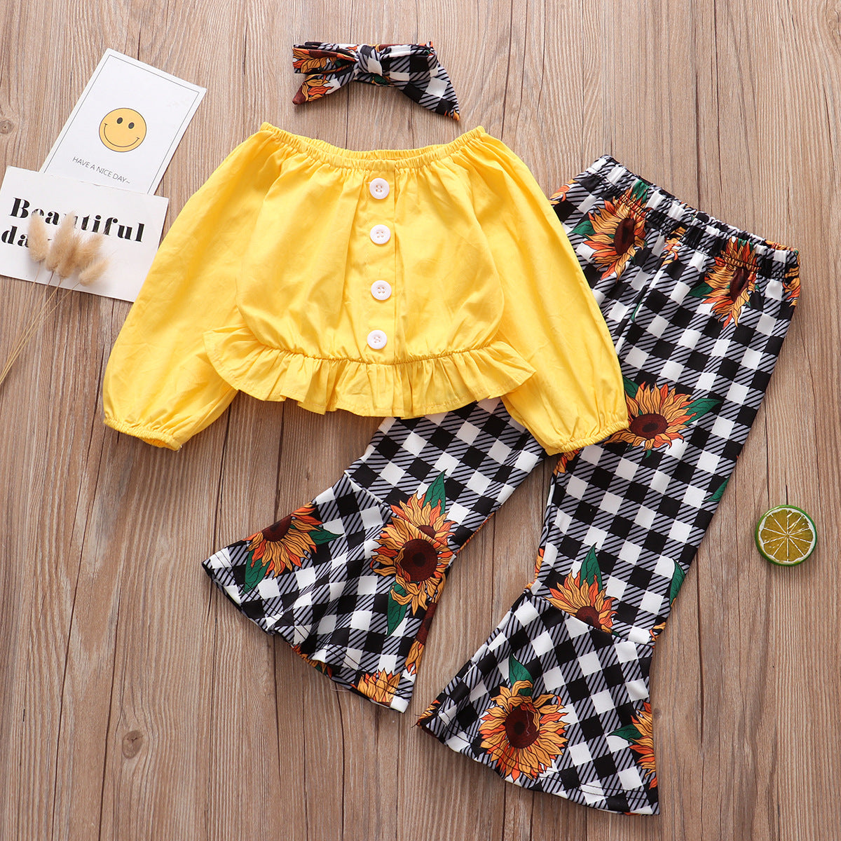 Comercio exterior, ropa para niños, venta al por mayor, otoño, nuevo estilo, blusa amarilla de manga larga, pantalones a cuadros con flores y sol, traje para niña, conjunto de 3 piezas