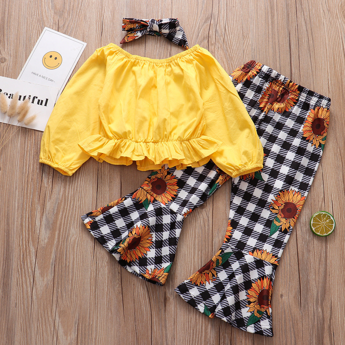 Comercio exterior, ropa para niños, venta al por mayor, otoño, nuevo estilo, blusa amarilla de manga larga, pantalones a cuadros con flores y sol, traje para niña, conjunto de 3 piezas