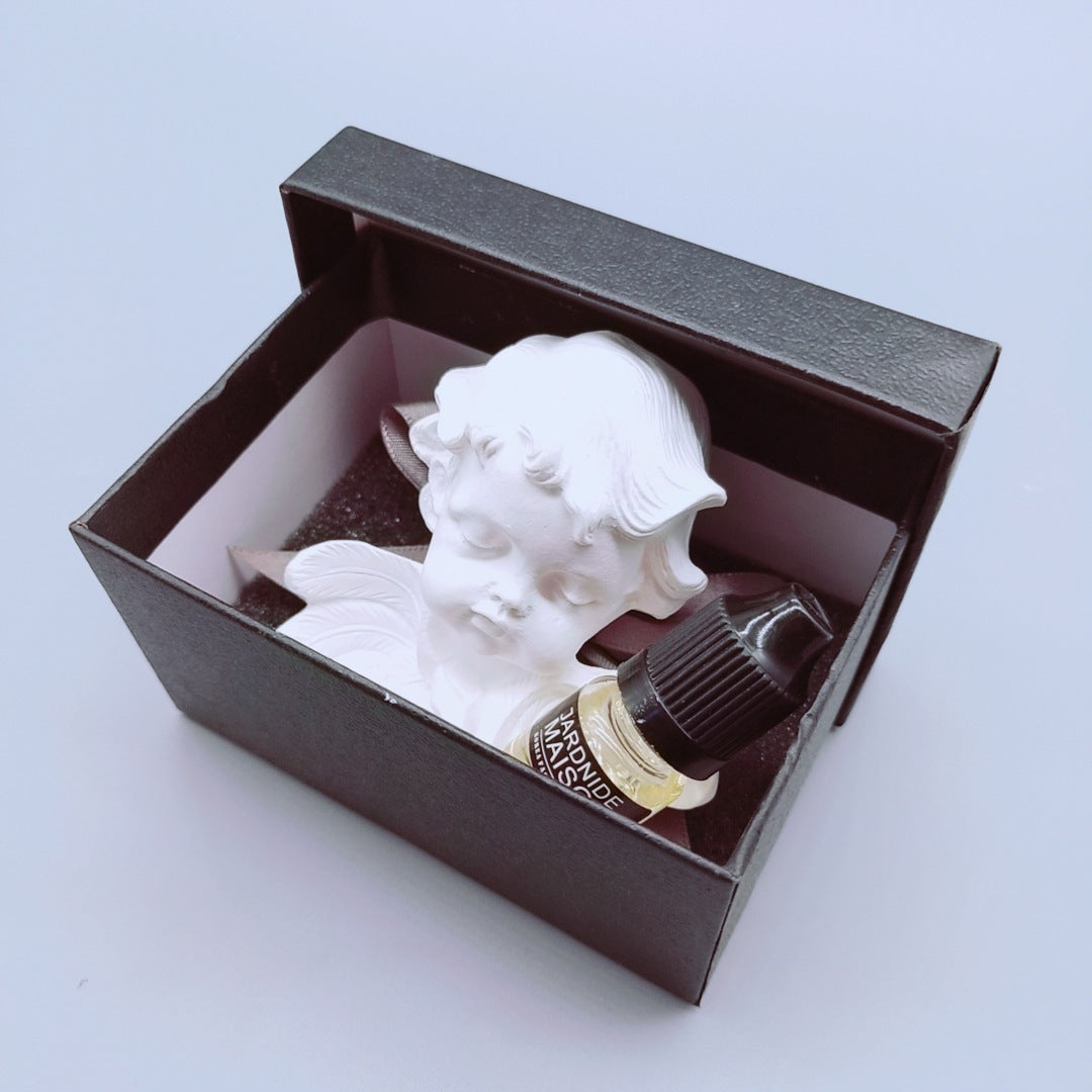 Fragancia para automóvil Ins, viento nórdico, ángel durmiente, salida de aire, clip de perfume, adornos interiores de piedra de expansión para automóvil, regalos para automóviles nuevos.