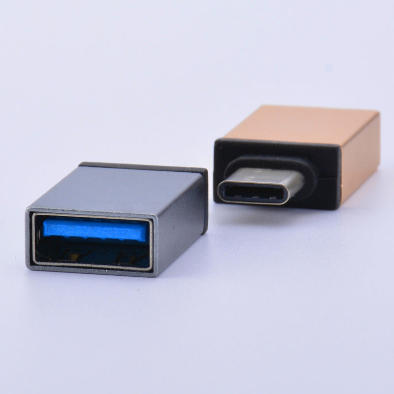 Adaptateur pour téléphone portable