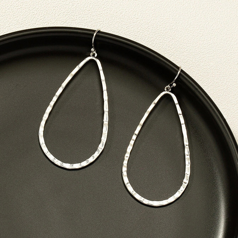 Pendientes de metal con forma de gota de agua, diseño de personalidad simple