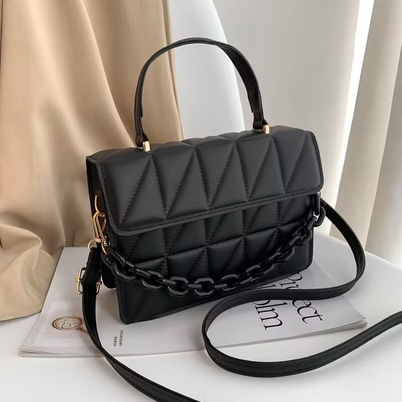 Bolso bandolera de hombro con textura simple y moderno
