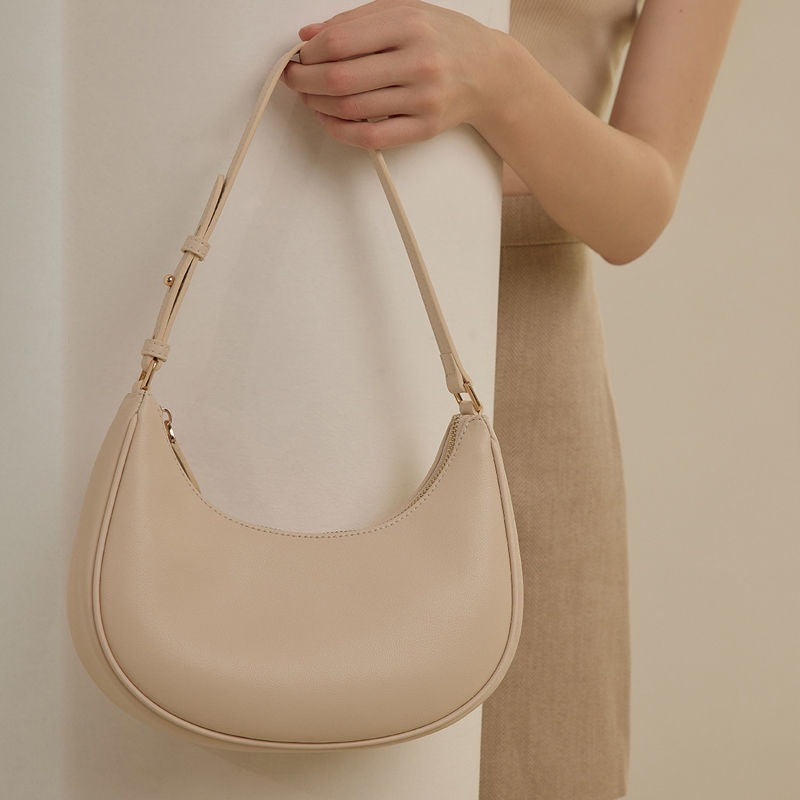 Conception d'un sac sous les bras de nouveau style de niche à une épaule