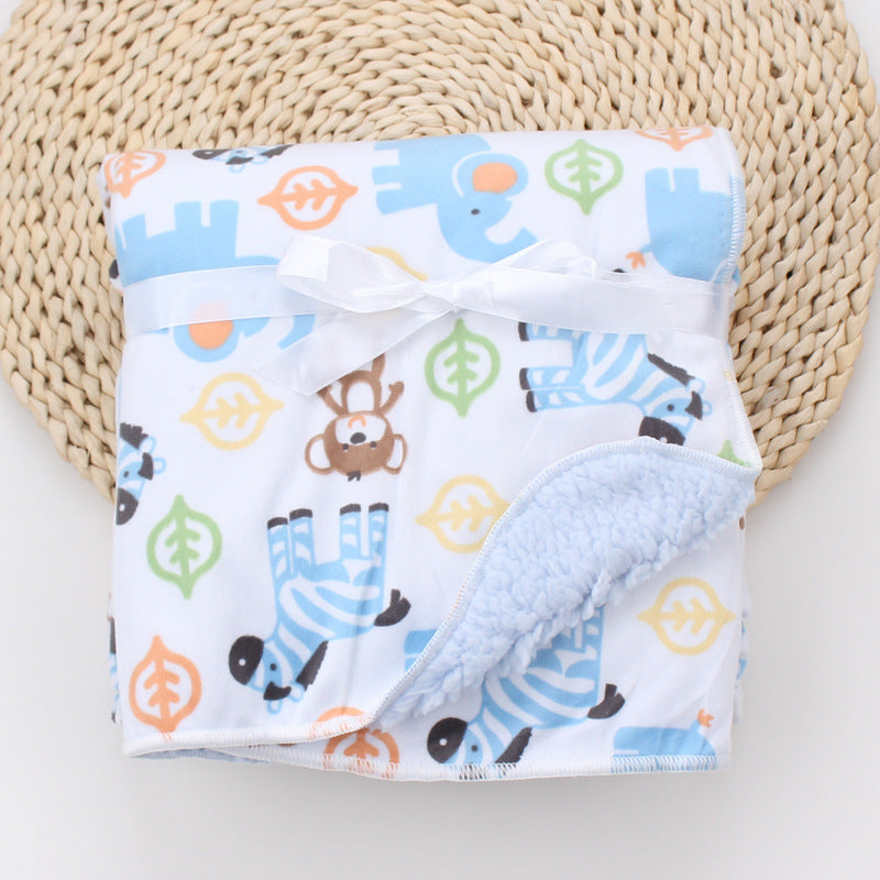 Manta de bebé con estampado de dibujos animados.