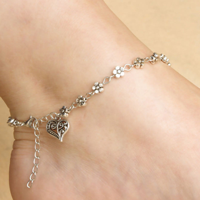 Bracelet de cheville tibétain en argent creux en forme de fleur de prunier, ornements de pied en forme de cœur