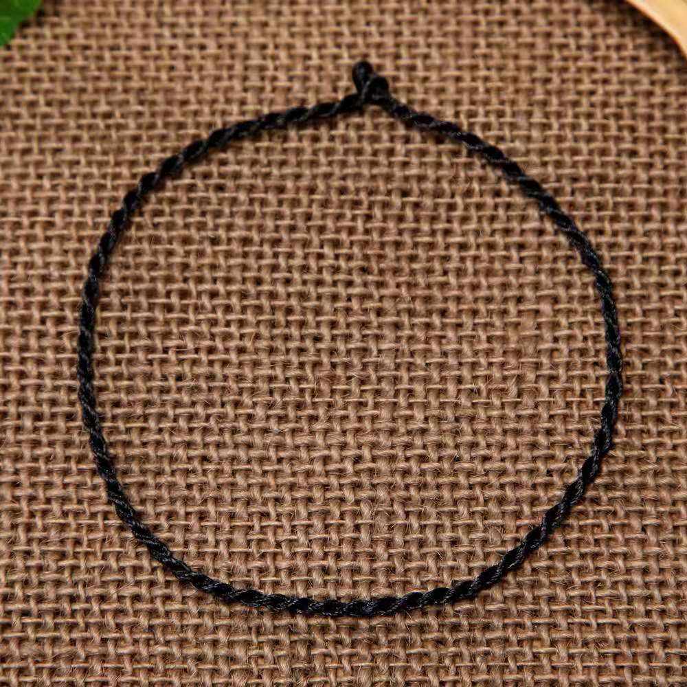 Bracelet tissé à la main en corde rouge de cette année animale