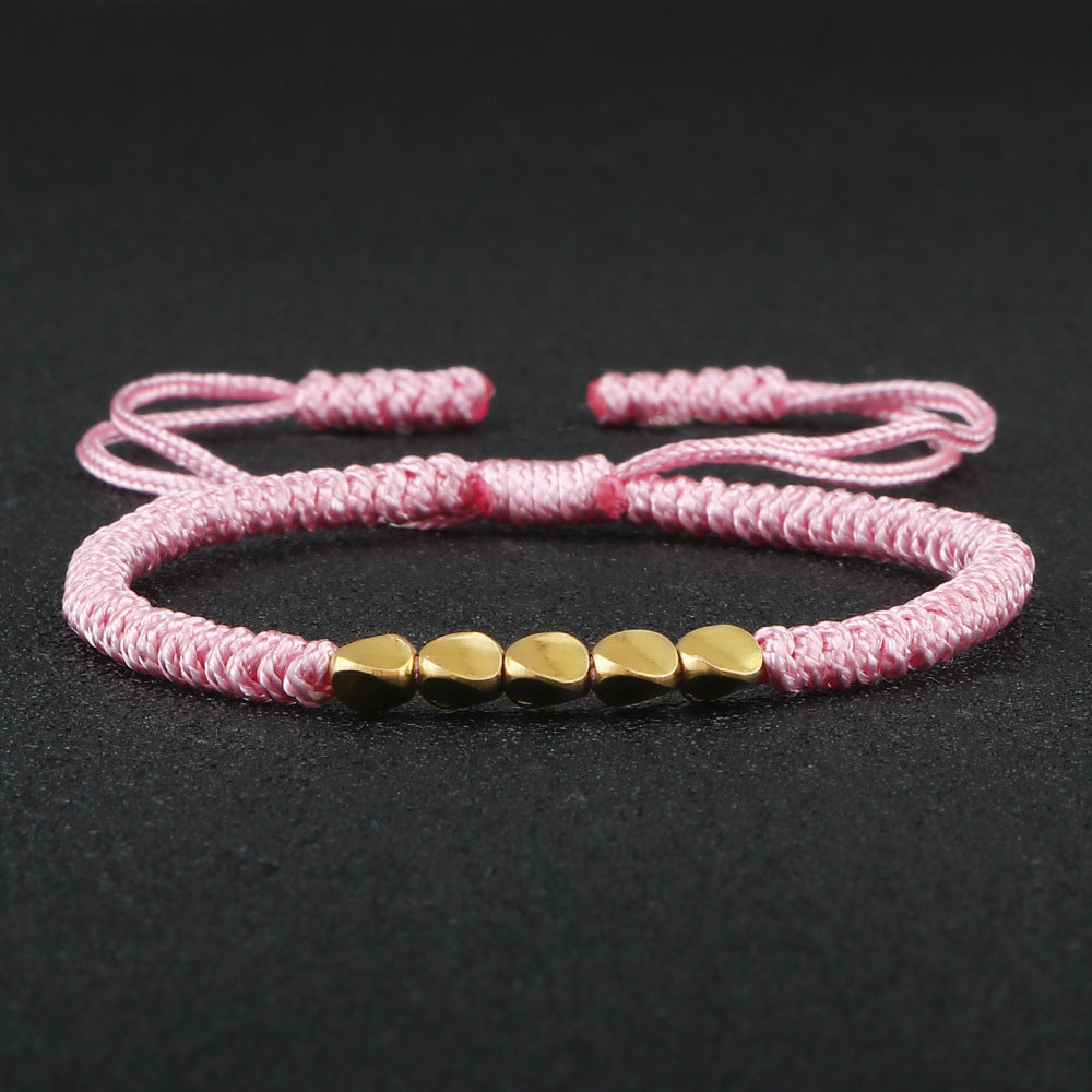 Bracelet perlé en perles de cuivre de forme irrégulière tissé à la main