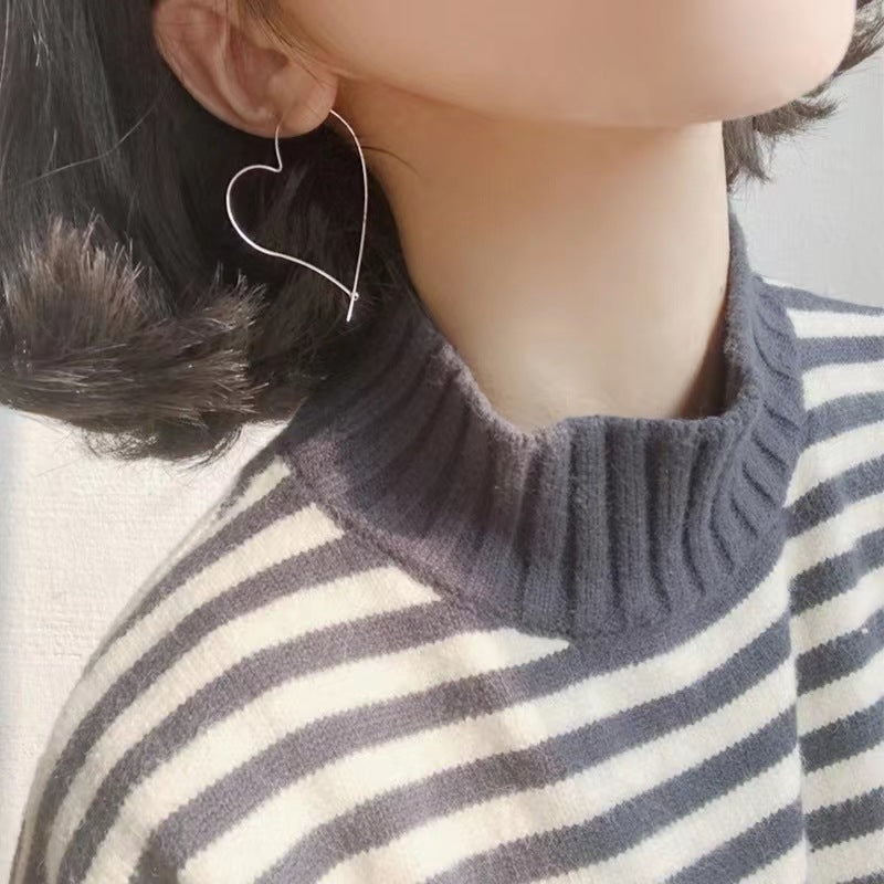 Boucles d'oreilles creuses en forme de cœur, personnalité gracieuse à la mode