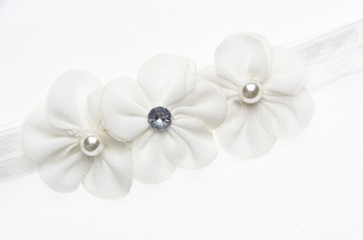 Bandeau bébé trois petites fleurs de prunier