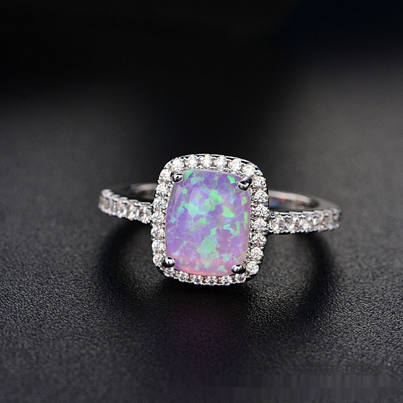 Anillo de ópalo de diamante rosa multicolor europeo y americano circonita con incrustaciones de moda Simple