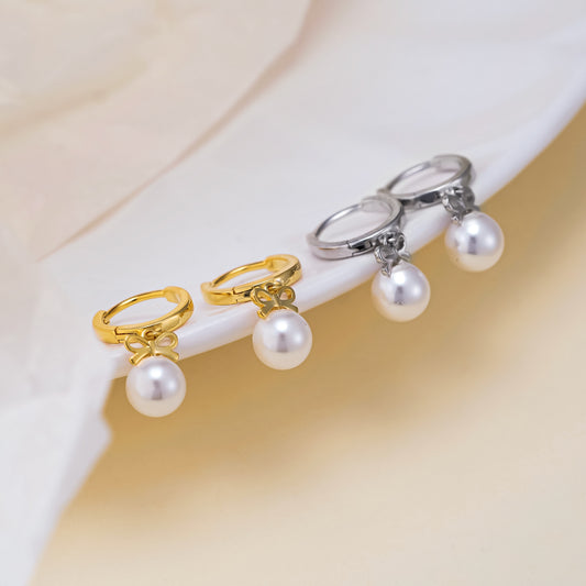 Boucles d'oreilles en perles artificielles avec nœud exquis