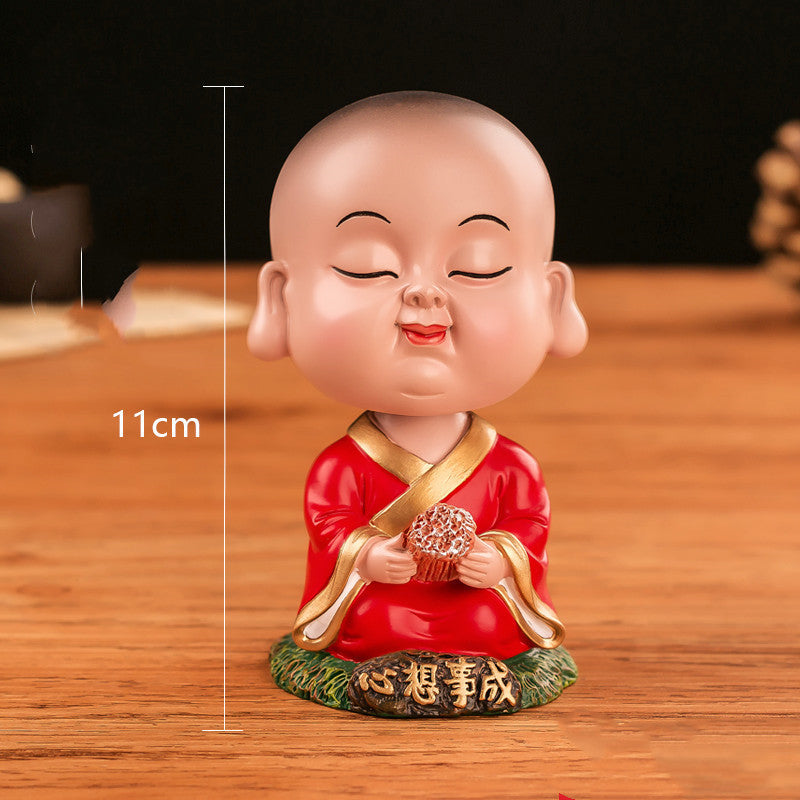 Car car decoration Zen Miao shook her head