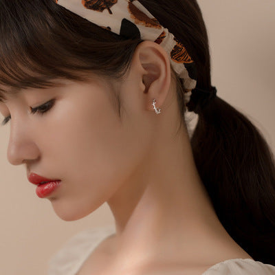 Simple and irregular woven wrapped ear buckle