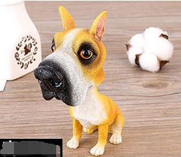 Figurines de chiot secouant la tête