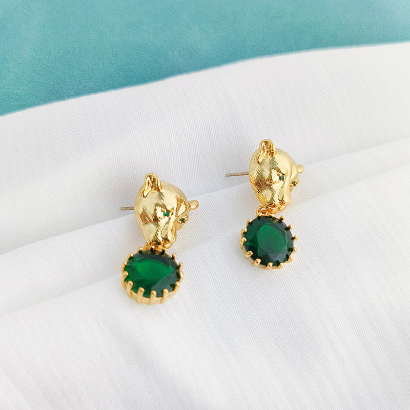 Boucles d'oreilles tête de léopard en zircon vert