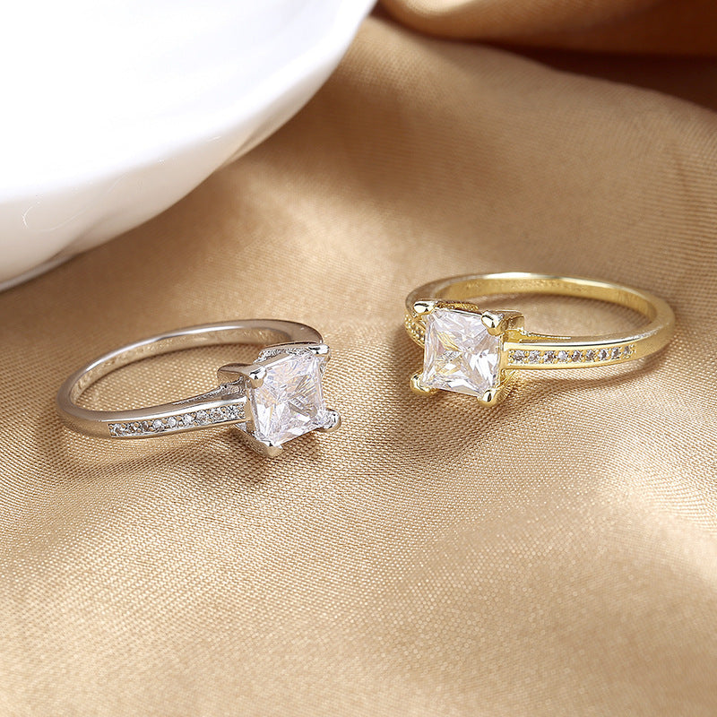 Anillo de diamantes de alta simulación de cuatro garras de moda simple para mujer