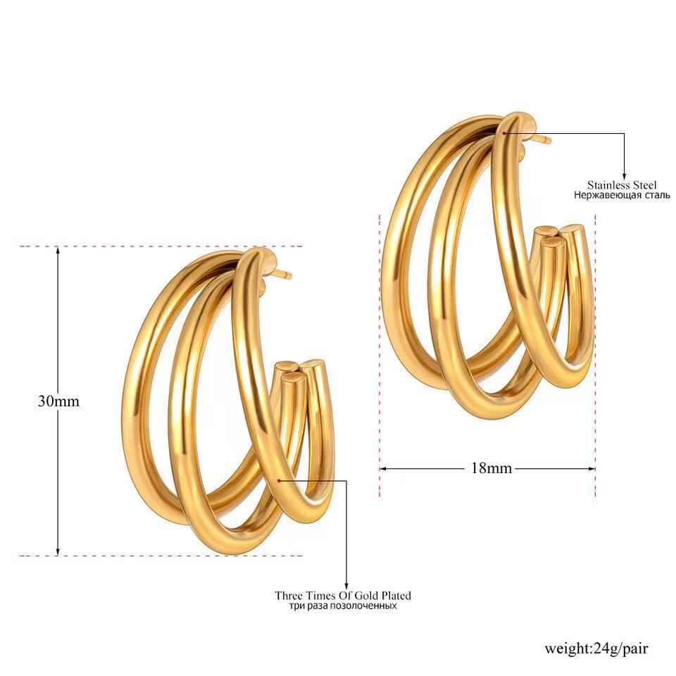 Boucles d'oreilles N multicouches en acier titane