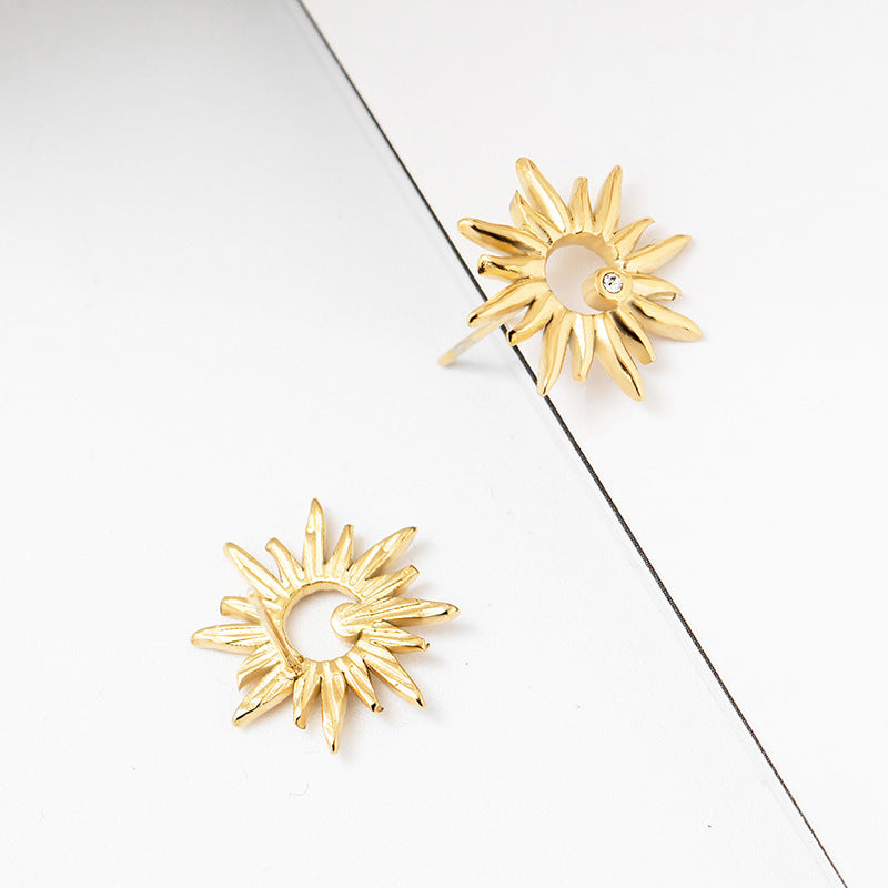 Clous d'oreilles Stereo Sun Flower en acier titane
