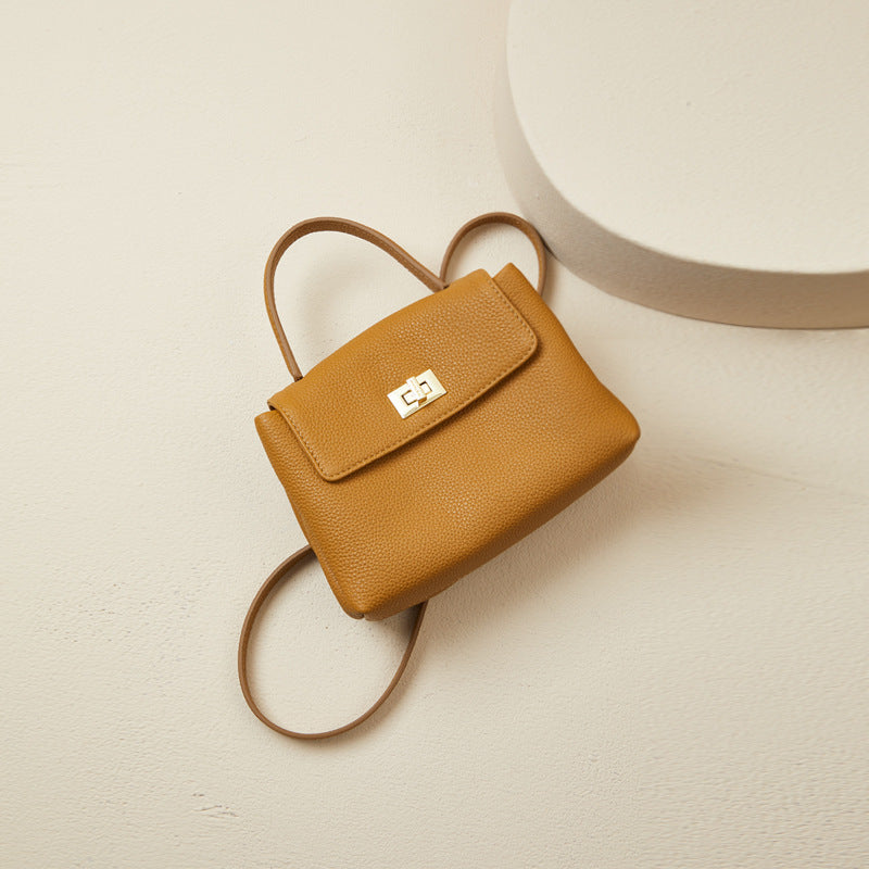 Mini sac portable en cuir de vache de première couche