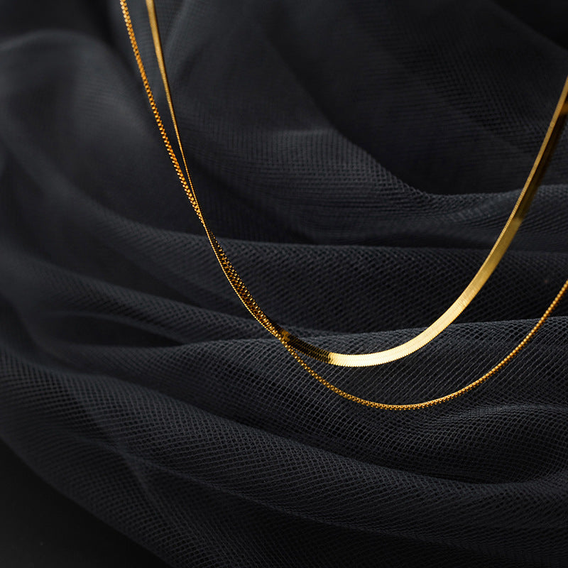 Collar de doble capa con cadena de huesos de serpiente