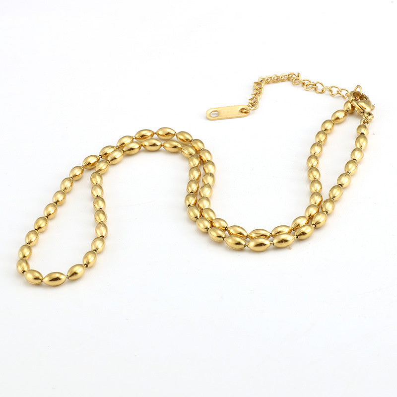 Collier chaîne de perles ovales plaquées acier inoxydable 18 carats