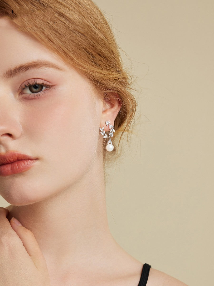 Boucles d'oreilles en perles de feuilles d'aiguille en argent à la mode