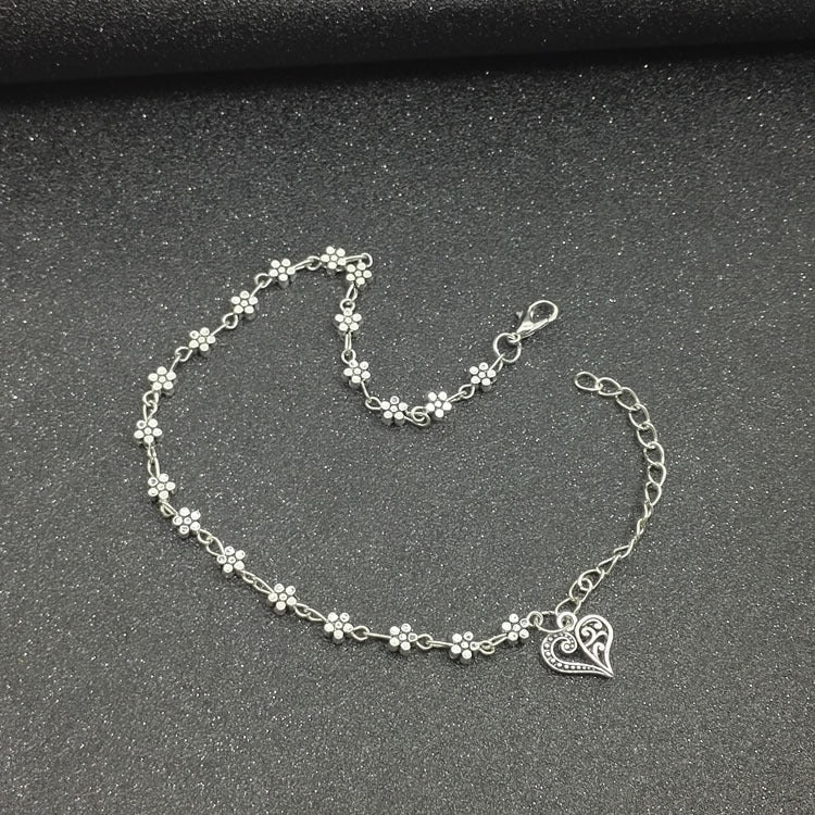 Bracelet de cheville tibétain en argent creux en forme de fleur de prunier, ornements de pied en forme de cœur