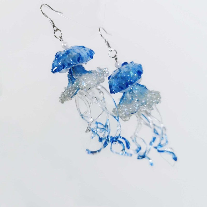 Boucles d'oreilles méduses longues faites à la main en résine créative
