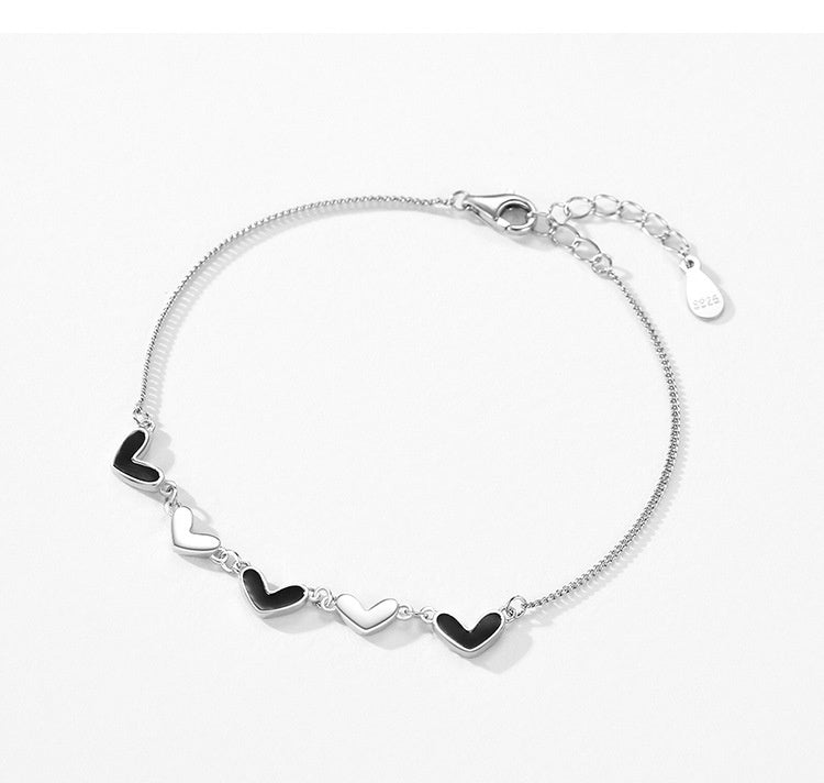 Pulsera de corazón de epoxi negro de plata de ley S925