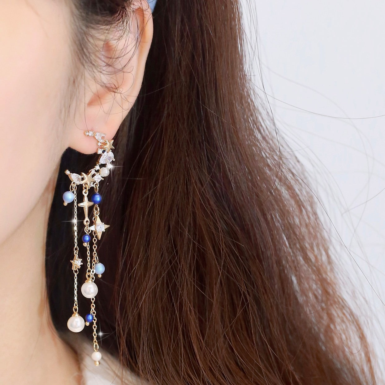 Boucles d'oreilles féeriques à effet fin avec pompon long