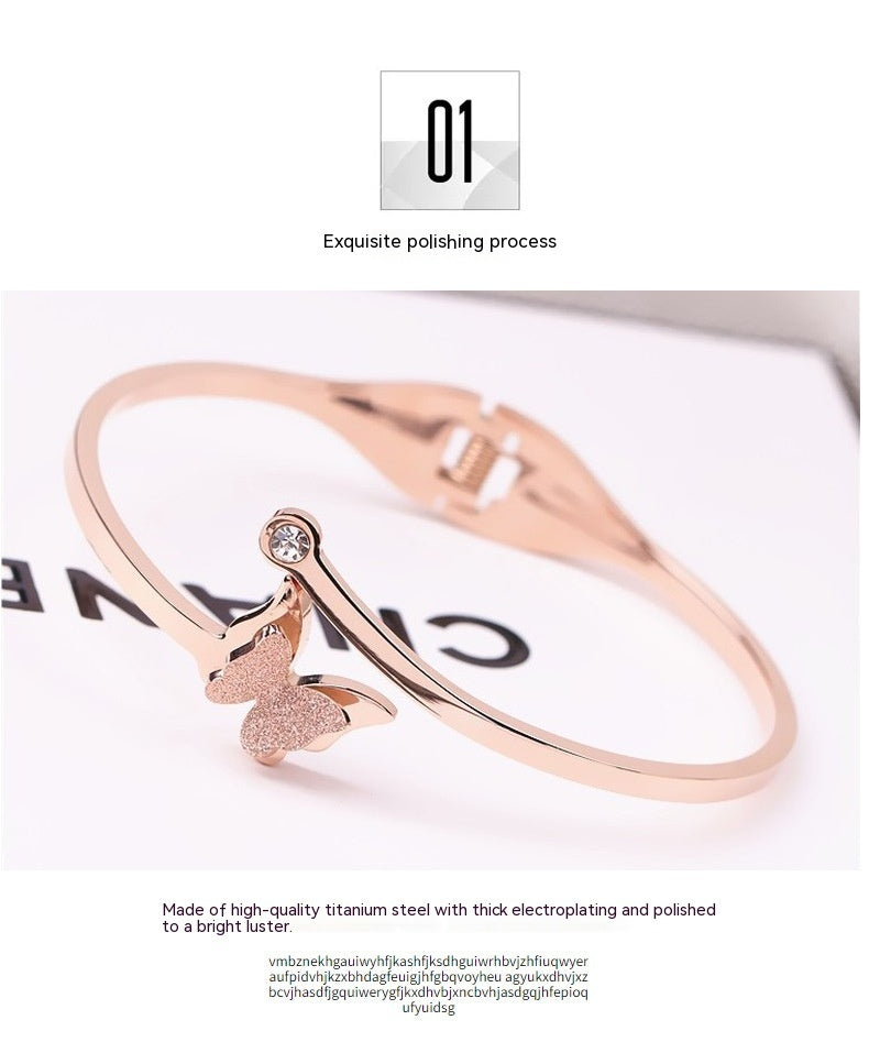 Pulsera simple femenina de mariposa de acero de titanio y oro rosa