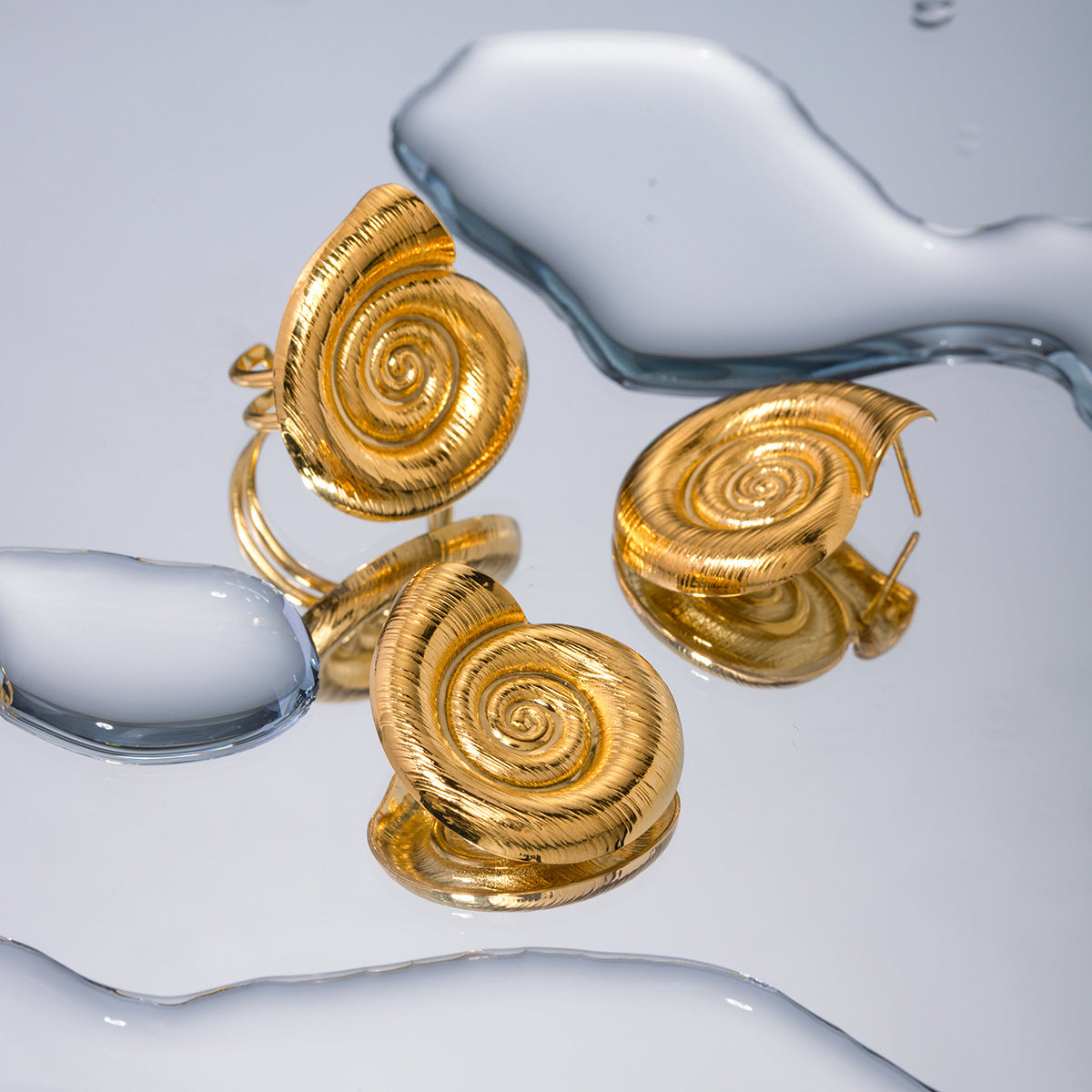Boucles d'oreilles créoles en fil de conque pour femme